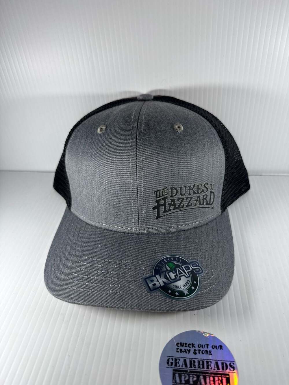 The Dukes of Hazzard Logo Heather Gray and Black Mesh Back Trucker Hat Snapback
